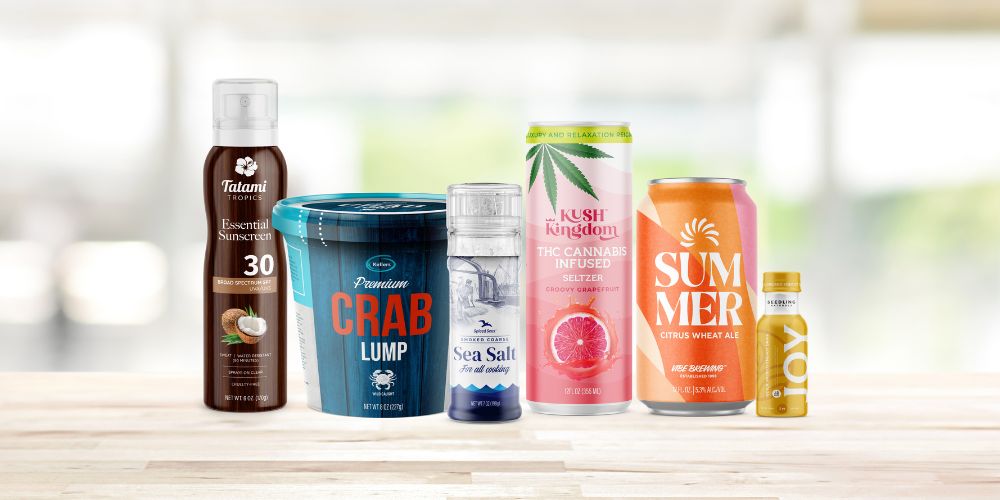 Colorful shrink sleeves on beverage cans in ice